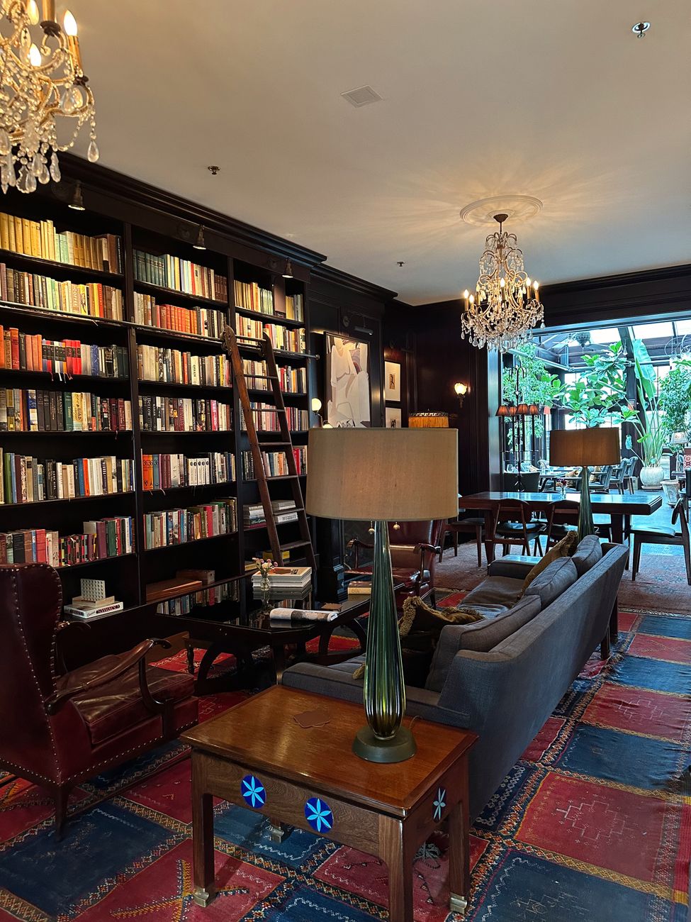 Cozy reading nook inside historic Alpine library hotel